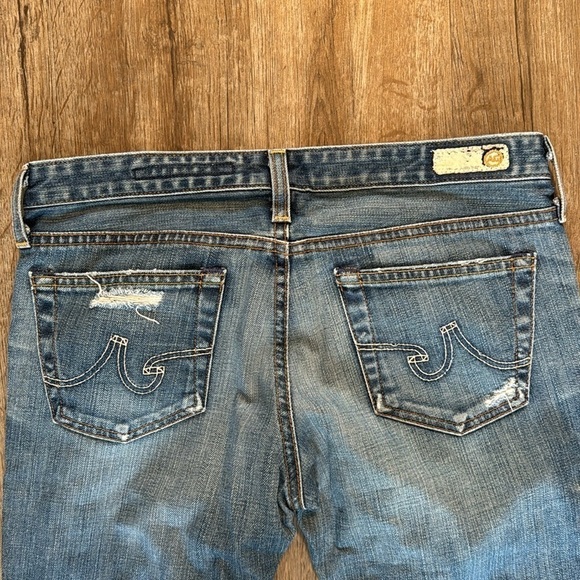 AG ADRIANO GOLDSCHMIED DISTRESSED BOOTCUT JEANS (27R) - Picture 8 of 10